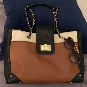 Black, brown, and white bag 14”x10”x4”